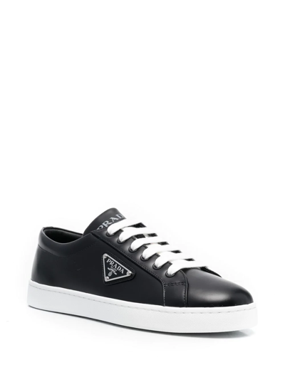 Shop Prada Triangle-logo Low-top Sneakers In Schwarz