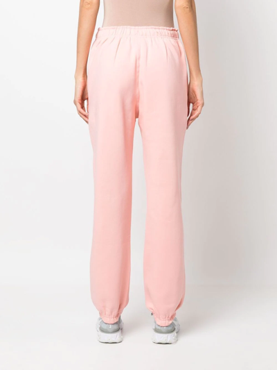 Shop Nike Embroidered-swoosh Detail Trousers In Rosa