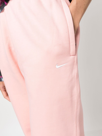 Shop Nike Embroidered-swoosh Detail Trousers In Rosa