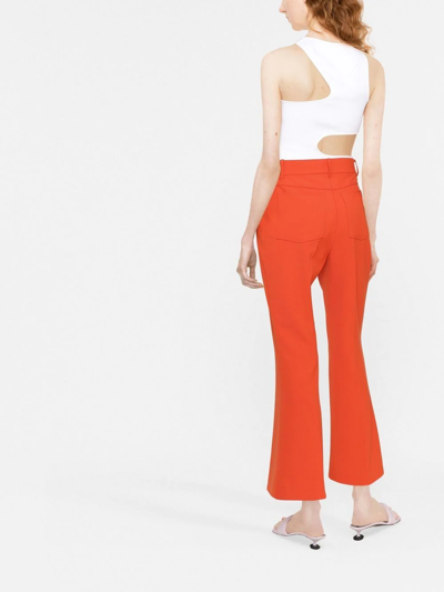 Shop Stella Mccartney High-rise Flared Trousers In Orange