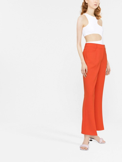 Shop Stella Mccartney High-rise Flared Trousers In Orange