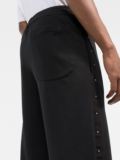 Shop Moncler Studded Drawstring Track Pants In Black
