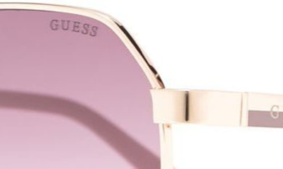 Shop Guess 58mm Round Sunglasses In Shiny Rose Gold / Bordeaux