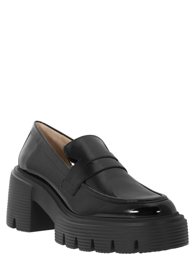 Shop Stuart Weitzman Soho - High Loafers In Black