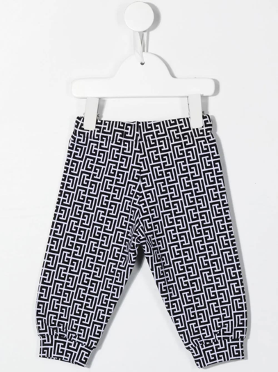 Shop Balmain Baby White And Black Joggers With All-over Monogram In Bianco/nero