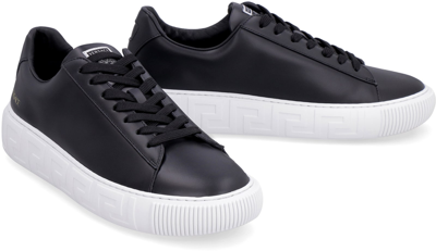 Shop Versace Greca Leather Sneakers In Black