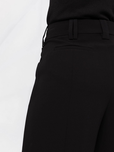 Shop Balmain Cotton Tapered Trousers In Schwarz