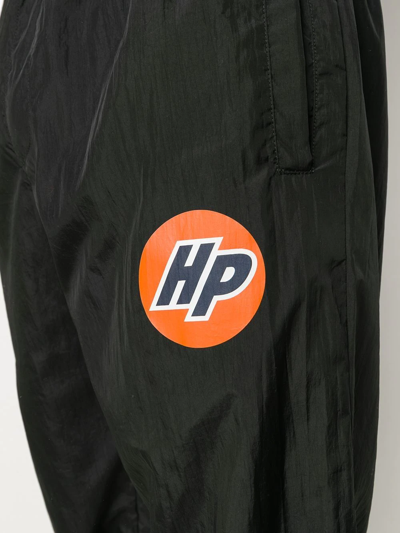 Shop Heron Preston Logo-print Trousers In 1020 Black Orange