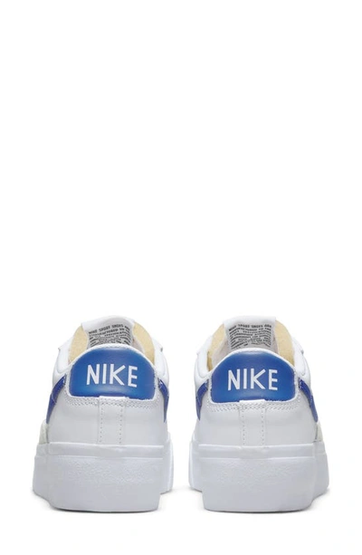 Shop Nike Blazer Low Platform Sneaker In White/ White/ Orange/ Royal