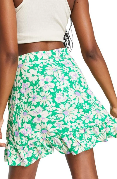 Shop Topshop Floral Print Ruffle Wrap Miniskirt In Mid Green