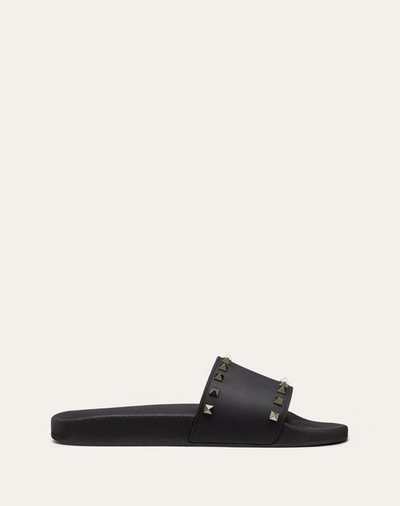 Shop Valentino Garavani Rockstud Rubber Slider Sandal In Black