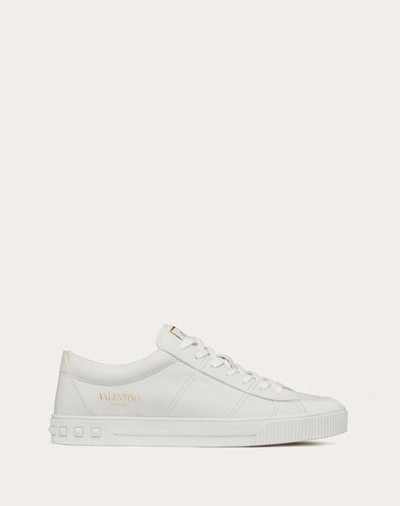 Shop Valentino Garavani Cityplanet Calfskin Sneaker In White
