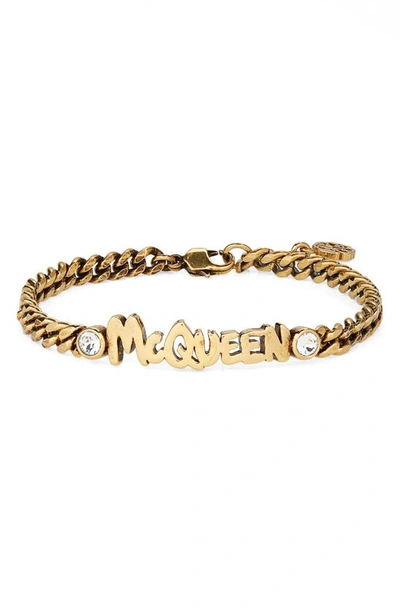 Shop Alexander Mcqueen Graffiti Logo & Crystal Link Bracelet In Gold