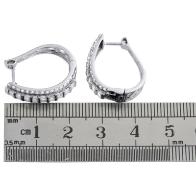 Pre-owned Jfl Diamonds & Timepieces 10k White Gold Tapered Baguette Diamond Oval Hinged Hoop Dome Earrings 1.50 Ct.