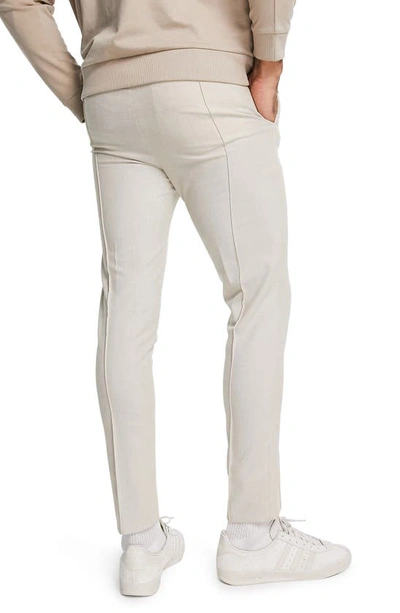 Shop Asos Design Skinny Fit Jogger Pants In Beige