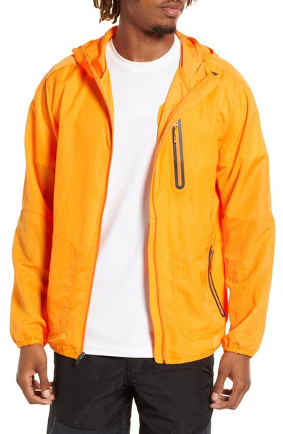 Shop Brady Ripstop Hooded Trail Jacket In Tangerine