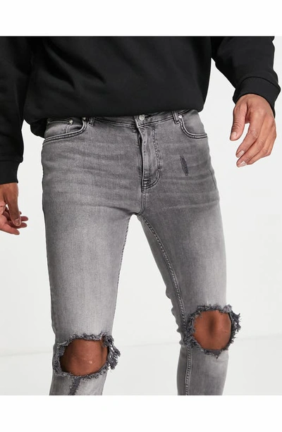 Asos Design Ripped Skinny Jeans In Black
