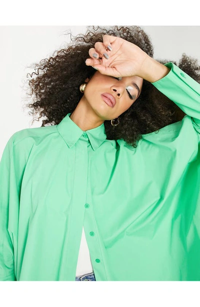 Shop Asos Design Oversize Cotton Button-up Shirt In Mid Green