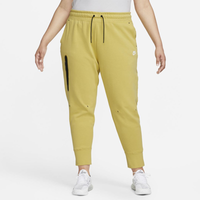 Shop Nike Women's  Sportswear Tech Fleece Pants (plus Size) In Green