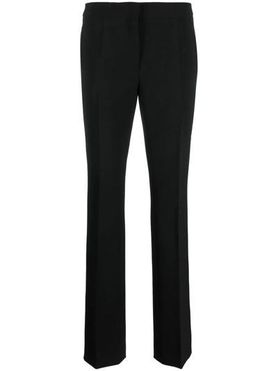 Shop Moschino Flared Mid-rise Trousers In Schwarz