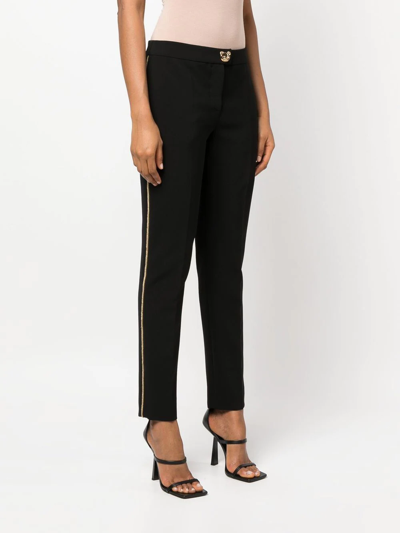 Moschino Tapered Side-stripe Trousers In Schwarz