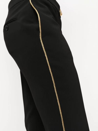 Moschino Tapered Side-stripe Trousers In Schwarz