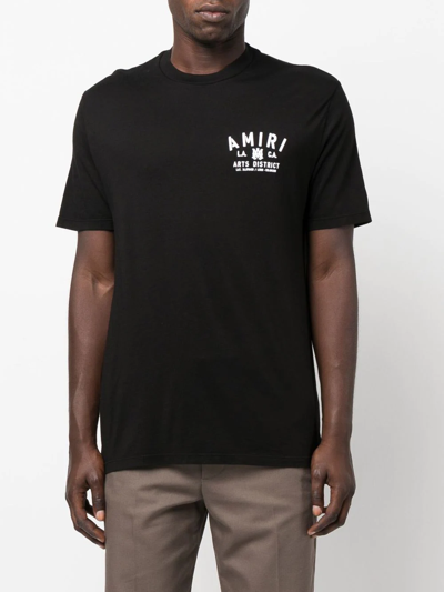 Shop Amiri Logo-print Short-sleeve T-shirt In Schwarz