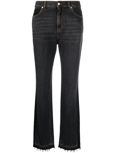 Shop Alexander Mcqueen High-waist Bootcut Jeans In Schwarz