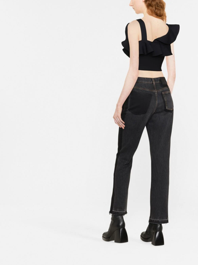 Shop Alexander Mcqueen High-waist Bootcut Jeans In Schwarz