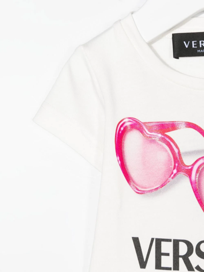Shop Versace Sunglasses Logo-print T-shirt In White