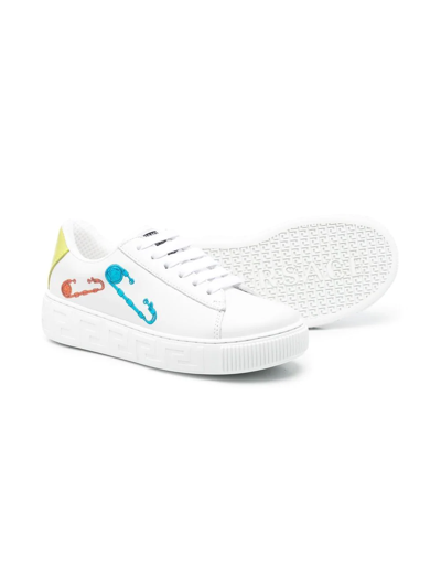 Shop Versace Low-top Sneakers In White