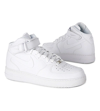 Shop Nike Air Force Ones Mid–tops In White/white
