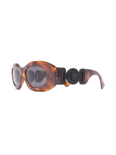 Shop Versace Medusa Oval-frame Sunglasses In Brown