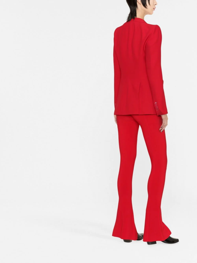 Shop Norma Kamali High-waisted Flared Trousers In Red