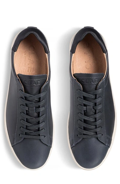 Shop Clae Bradley Water Repellent Sneaker In Deep Navy Leather