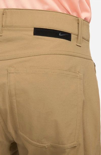 Shop Nike Dri-fit Repel Water Repellent Slim Fit Golf Pants In Dark Driftwood