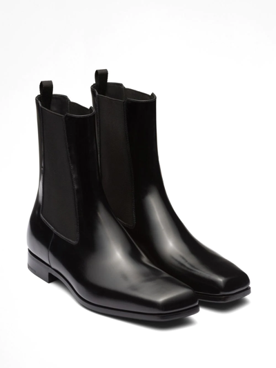 Shop Prada Brushed Leather Chelsea Boots In Black