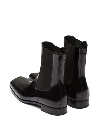 Shop Prada Brushed Leather Chelsea Boots In Black