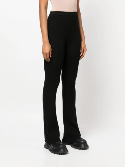 Shop Rick Owens Ribbed-knit Bootcut Trousers In Black