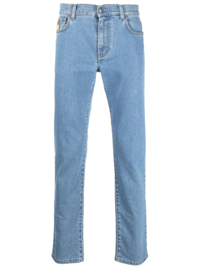 Shop Moschino Slim Jeans With Logo In Blue