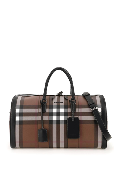 Shop Burberry Check Coated Canvas Holdall In Brown,black