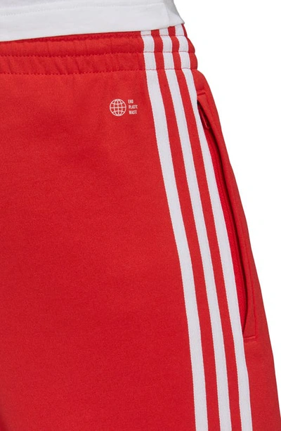 Shop Adidas Originals Adicolor Classics Primeblue Sst Track Pants In Vivid Red