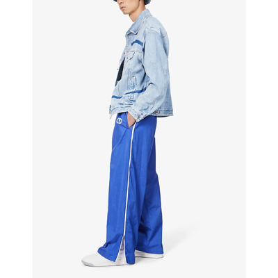 Shop Valentino Logo-embroidered Mid-rise Shell Jogging Bottoms In Blue Royal