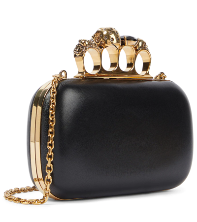 Alexander Mcqueen Skull Four Ring Embellished Clutch In Black