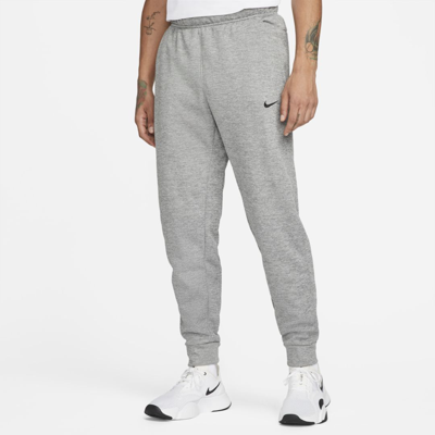 Shop Nike Men's  Therma Therma-fit Tapered Fitness Pants In Grey