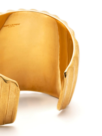 Shop Saint Laurent Oversize Groove Cuff Bracelet In Gold