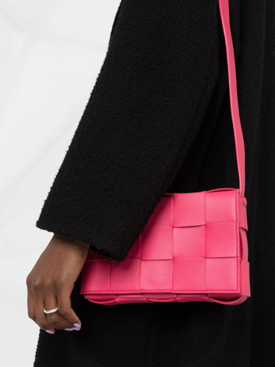 Shop Bottega Veneta Casette Intrecciato Crossbody Bag In Pink