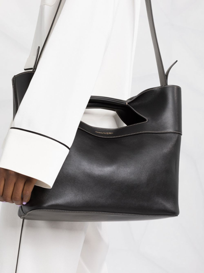 Shop Alexander Mcqueen Logo-print Tote Bag In Black