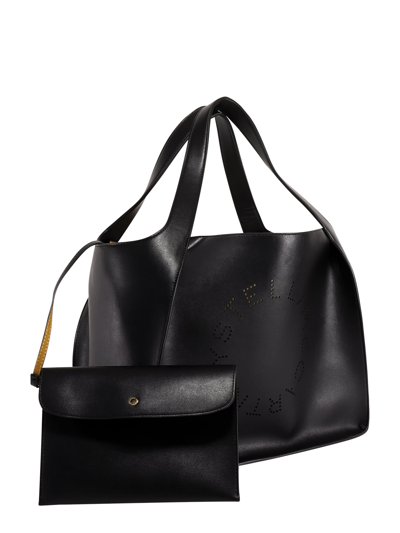 Shop Stella Mccartney Perforated Logo Tote In Black