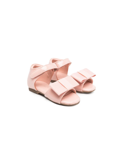 Shop Age Of Innocence Bow-detail Patent-leather Sandals In Pink